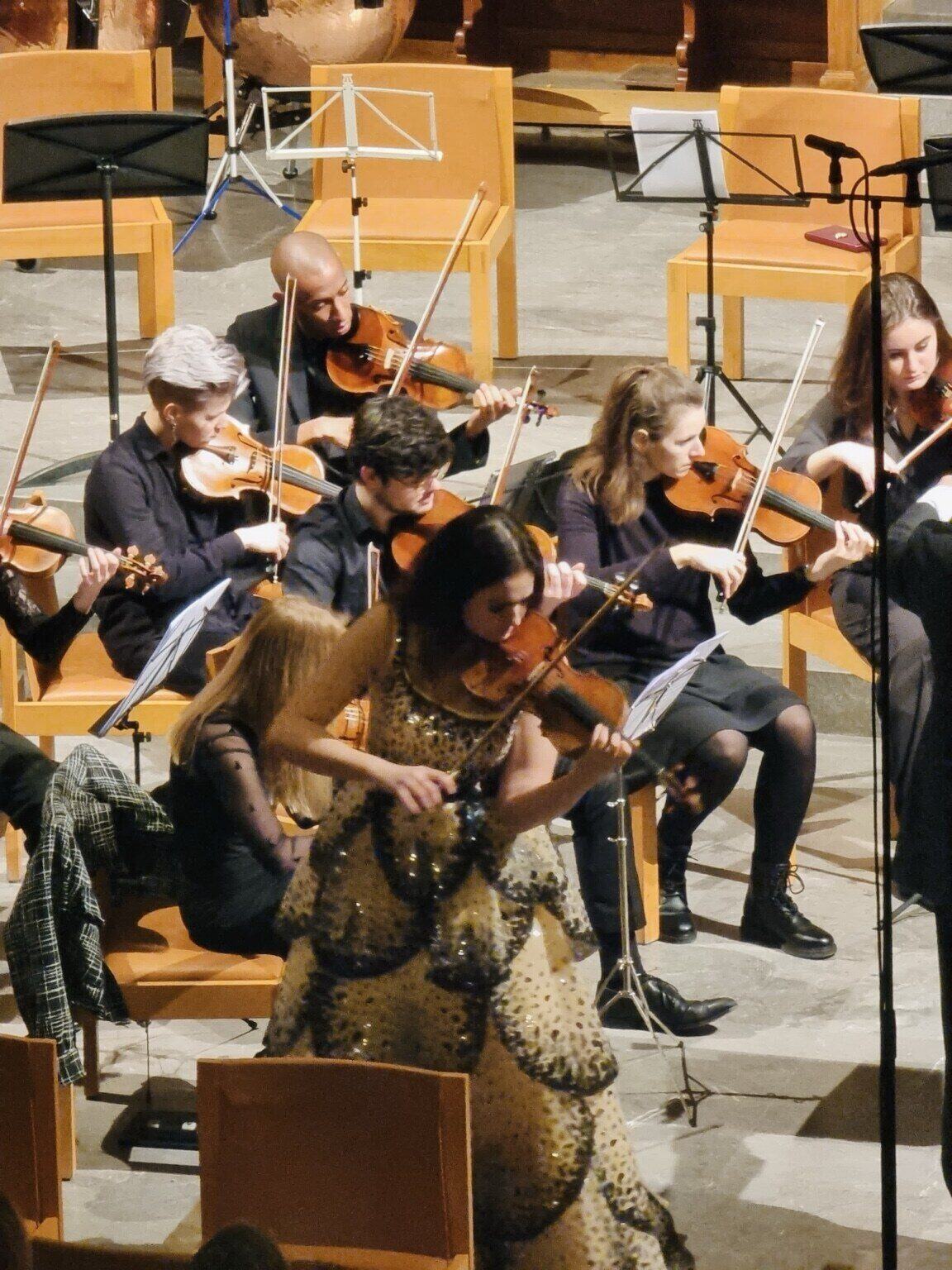 With orchestra